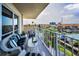 Relax on this balcony with outdoor seating and tranquil views of the marina and boats at 1621 Gulf Blvd # 407, Clearwater Beach, FL 33767