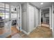 Hallway leads into a bedroom with glass doors, with a view to the balcony, and access to the bathroom at 1621 Gulf Blvd # 407, Clearwater Beach, FL 33767