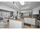 Bright kitchen with a center island and an adjacent dining area at 1621 Gulf Blvd # 407, Clearwater Beach, FL 33767
