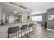 Contemporary kitchen with bar seating that opens to the adjacent dining area at 1621 Gulf Blvd # 407, Clearwater Beach, FL 33767