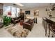 Comfortable lounge area with leather seating, a bar, and stylish decor for relaxation at 1621 Gulf Blvd # 407, Clearwater Beach, FL 33767