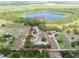 Expansive property featuring a home and a picturesque lake nearby at 17023 Alderman Turner Rd, Wimauma, FL 33598