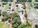 Aerial view of a property showcasing its boundaries and lush surroundings at 17023 Alderman Turner Rd, Wimauma, FL 33598