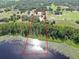 Large lot backing up to a lake and wooded area providing privacy at 17023 Alderman Turner Rd, Wimauma, FL 33598