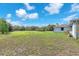 Home with a large lawn and plenty of space to enjoy outdoor activities at 17023 Alderman Turner Rd, Wimauma, FL 33598