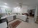 Spacious kitchen with white cabinets, stainless appliances, and plenty of countertop space at 210 Kingsway Dr, Temple Terrace, FL 33617