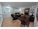 Charming living room featuring a fireplace, comfortable seating, and stylish decor elements at 210 Kingsway Dr, Temple Terrace, FL 33617