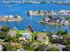 Desirable waterfront estate with lush lawns, private dock, and stunning bay views at 224 Harbor View Ln, Largo, FL 33770