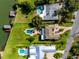 Waterfront property with pool, expansive lawns, and private boat dock at 224 Harbor View Ln, Largo, FL 33770