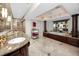 Spacious bathroom featuring a jacuzzi tub, double vanity with granite countertop, and glass shower at 224 Harbor View Ln, Largo, FL 33770