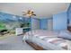 Charming blue bedroom with underwater mural, a desk area, and a comfortable bed at 224 Harbor View Ln, Largo, FL 33770