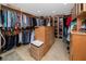 Large walk-in closet featuring ample storage space and custom shelving at 224 Harbor View Ln, Largo, FL 33770