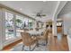 Dining room features water view and natural light at 241 176Th Terrace E Dr, Redington Shores, FL 33708