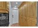 Ample kitchen storage with lots of light wood cabinets, and dark countertops at 241 176Th Terrace E Dr, Redington Shores, FL 33708