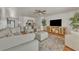 Living room features recessed lighting, ceiling fan, and modern decor at 241 176Th Terrace E Dr, Redington Shores, FL 33708