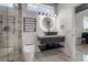 Contemporary bathroom featuring sleek fixtures and modern lighting at 27528 Water Ash Dr, Wesley Chapel, FL 33544