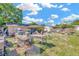 This backyard has a yard, a shed, and animal cages at 306 Brandywine Dr, Valrico, FL 33594