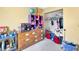 This bedroom features a dresser, closet, and yellow walls at 306 Brandywine Dr, Valrico, FL 33594