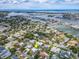 Community aerial showcasing the desirable neighborhood, lush greenery, and convenient location at 308 Cedar Ln, Largo, FL 33770