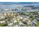 Panoramic aerial view of the community, highlighting its waterfront location and neighborhood setting at 308 Cedar Ln, Largo, FL 33770
