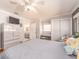 Comfortable bedroom featuring closet, decor, and natural light at 308 Cedar Ln, Largo, FL 33770