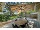 Outdoor patio featuring a dining table set and beautiful backyard at 3315 W Hawthorne Rd, Tampa, FL 33611
