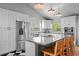 Bright and airy kitchen with a large island, stainless steel appliances, and ample cabinet space at 3315 W Hawthorne Rd, Tampa, FL 33611