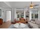 Comfortable seating area with hardwood flooring, neutral walls, and lots of natural light at 3315 W Hawthorne Rd, Tampa, FL 33611