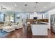 Bright, open kitchen featuring stainless steel appliances, island with bar seating at 3503 W Price Ave, Tampa, FL 33611