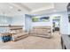 Upstairs loft area with comfortable seating and a view of the living space below at 3503 W Price Ave, Tampa, FL 33611
