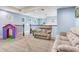 Upstairs loft features comfortable seating and view of the outdoors at 3503 W Price Ave, Tampa, FL 33611
