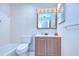 Full bathroom with tiled shower-tub and wood vanity at 40019 Pretty Redbird Rd, Zephyrhills, FL 33540
