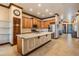Well-equipped kitchen boasts stainless appliances, neutral paint, and quartz countertops at 4400 English Turn Way, Wesley Chapel, FL 33543