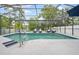 Refreshing screened pool surrounded by lounge chairs, perfect for relaxation at 4419 Gaston St, Spring Hill, FL 34607