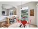 Cozy breakfast nook with a round table and a view of the backyard at 4926 Pennecott Way, Wesley Chapel, FL 33544