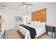 Serene bedroom with a large bed, ceiling fan, and stylish decor providing a relaxing retreat at 4926 Pennecott Way, Wesley Chapel, FL 33544