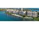 Stunning aerial view of waterfront condos with pools and beach access at 4953 Bacopa S Ln # 205, St Petersburg, FL 33715