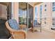 Cozy balcony with comfortable seating offers a relaxing outdoor space at 4953 Bacopa S Ln # 205, St Petersburg, FL 33715