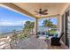 Spacious balcony featuring comfortable seating and panoramic views of the bay at 4953 Bacopa S Ln # 205, St Petersburg, FL 33715