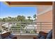 Enjoy lush treetop views from the spacious balcony with comfortable seating at 4953 Bacopa S Ln # 205, St Petersburg, FL 33715