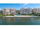 Luxury waterfront condos feature a private beach access and community pool, offering resort-style living at 4953 Bacopa S Ln # 205, St Petersburg, FL 33715