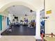 A well-equipped fitness center with various machines and exercise equipment at 4953 Bacopa S Ln # 205, St Petersburg, FL 33715