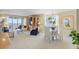 Inviting living room with water views, comfortable seating, and elegant dining area at 4953 Bacopa S Ln # 205, St Petersburg, FL 33715