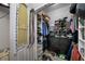 Organized walk-in closet with shelves and clothing racks at 538 Bamboo Ln, Clearwater, FL 33764