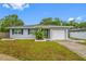Charming single-story home with a well-maintained lawn and inviting curb appeal at 538 Bamboo Ln, Clearwater, FL 33764