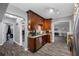 Modern kitchen featuring dark wood cabinets, stainless steel appliances, and granite countertops at 538 Bamboo Ln, Clearwater, FL 33764