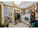 Bright laundry room with tile flooring and modern washer and dryer at 538 Bamboo Ln, Clearwater, FL 33764