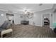 Large, inviting living room with open doorways to other rooms at 538 Bamboo Ln, Clearwater, FL 33764
