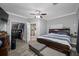 Serene main bedroom with a large bed and an ensuite bathroom at 538 Bamboo Ln, Clearwater, FL 33764
