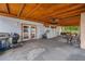 Covered patio area with an outdoor bar and seating, perfect for entertaining at 538 Bamboo Ln, Clearwater, FL 33764